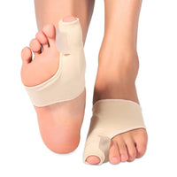 Pair of beige bunion corrector toe splint straighteners worn on both feet
