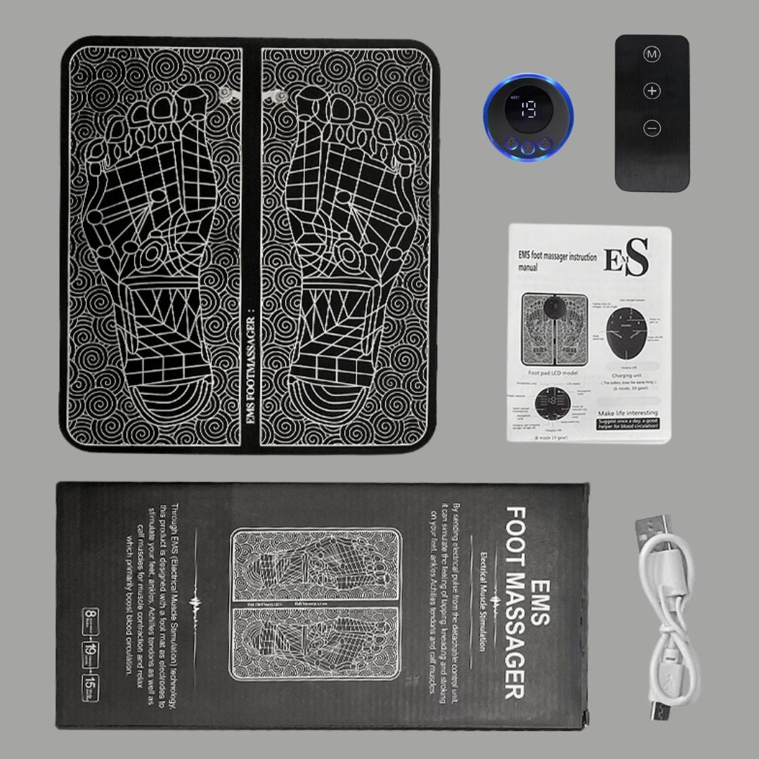 EMS Foot Massage Mat complete box contents including mat, controller, remote, USB cable and manual