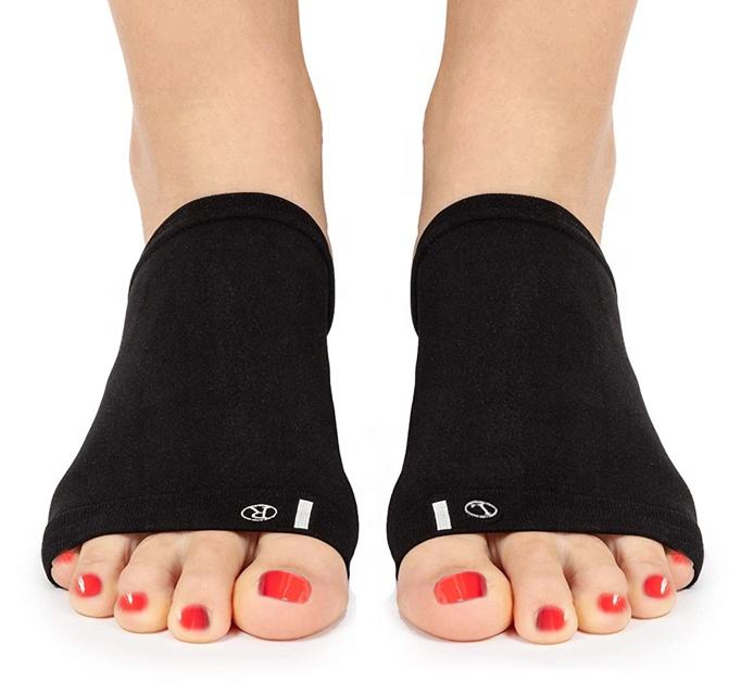 Pair of black Foot Arch Support Sleeves worn on both feet front view