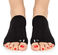 Pair of black Foot Arch Support Sleeves worn on both feet front view