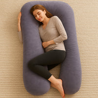 Overhead view of woman sleeping inside dark grey U-shape Full Body Pillow