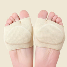 Load image into Gallery viewer, Beige gel metatarsal pad sleeves worn on both feet, bottom view showing open-toe design and cushioned ball-of-foot padding