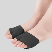 Black metatarsal pad sleeves worn on both feet, side angle showing open-toe elastic fit across the ball of the foot