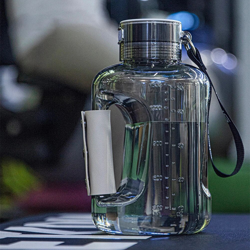 Large clear hydrogen water bottle generator with volume markings and carry strap