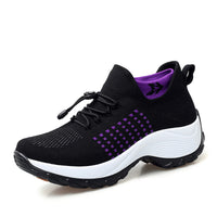 Burgundy Orthopaedic Comfort Shoes for Women held showing knit upper and sole