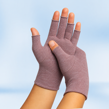 Load image into Gallery viewer, Mauve Therapeutic Heat Gloves pair raised against light blue background