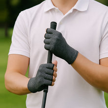 Load image into Gallery viewer, Pair of pink Therapeutic Heat Gloves raised against light blue background