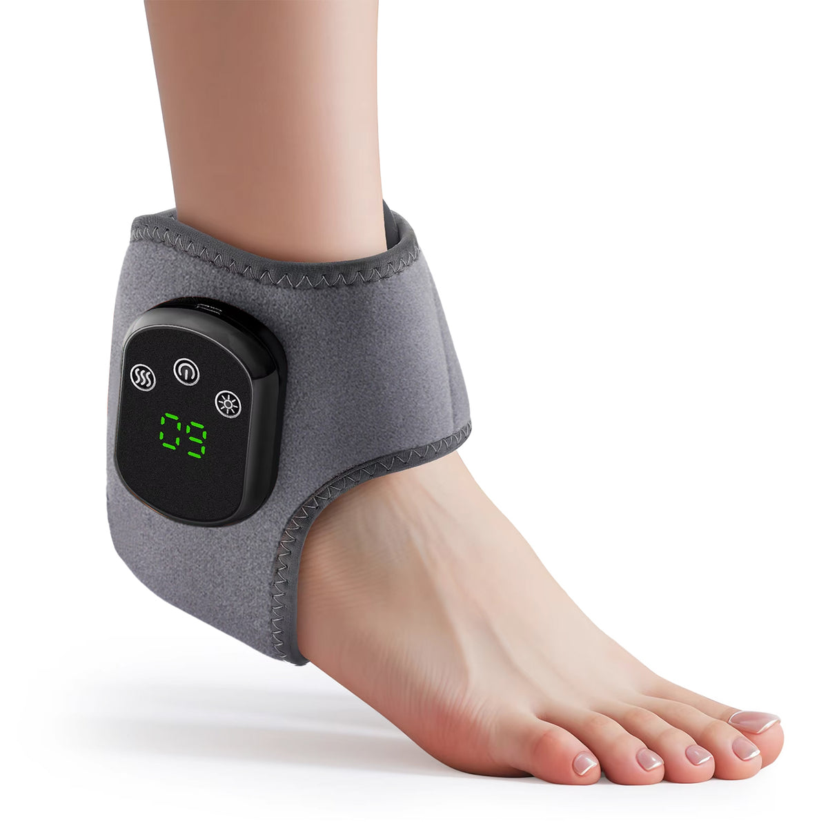 Grey wireless electric heating ankle wrap on bare foot with orange heat glow graphic on white background