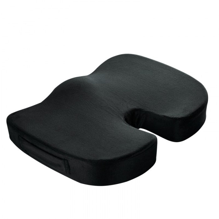 Black coccyx cushion for tailbone pain, angled front view