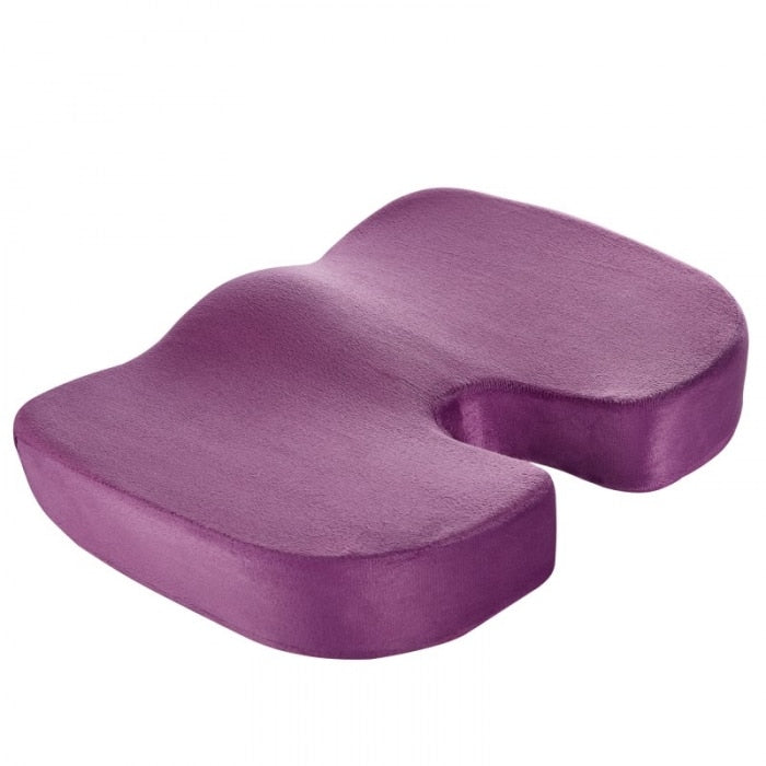 Purple coccyx cushion for tailbone pain, angled front view