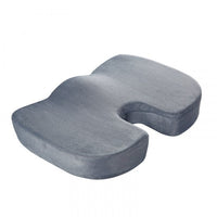 Grey coccyx cushion for tailbone pain, angled front view