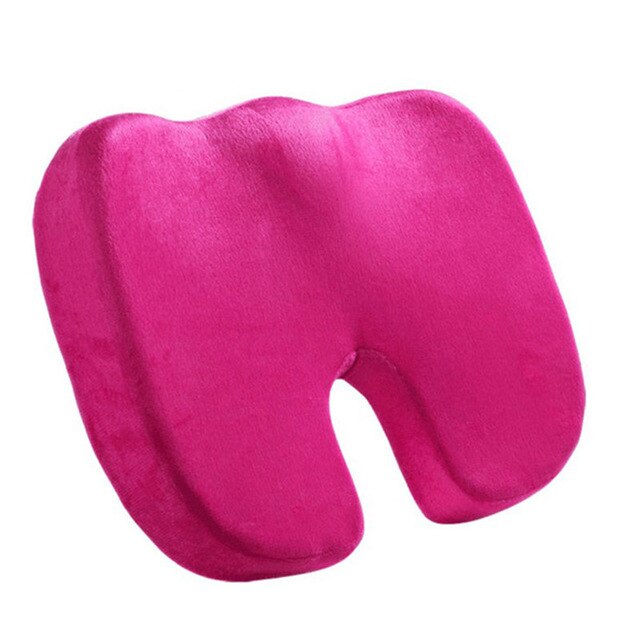 Hot pink coccyx cushion for tailbone pain, front-facing view