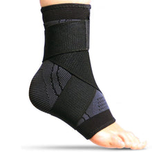 Load image into Gallery viewer, Black grey Compression Ankle Sleeve with wrap strap, side view on bare foot