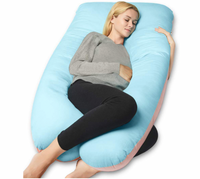 Woman sleeping against light blue and pink Full Body Pillow, white background