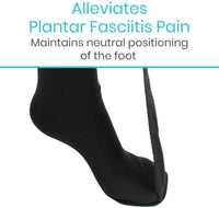 Close-up of foot in black night splint sock with tension strap under sole and plantar fasciitis pain relief text