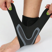 Load image into Gallery viewer, Hands pulling black and grey Plantar X Wrap straps around bare ankle