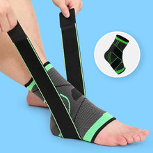 Load image into Gallery viewer, Hands applying green black Compression Ankle Sleeve with cross straps on ankle
