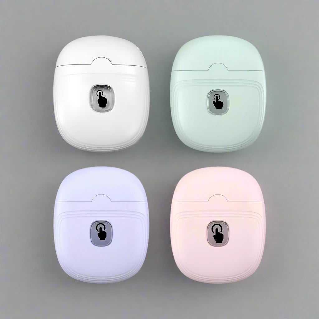 Four electric nail clippers in white, mint, lavender and pink colour variants shown from above