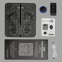 EMS Foot Massage Mat complete box contents including mat, controller, remote, USB cable and manual