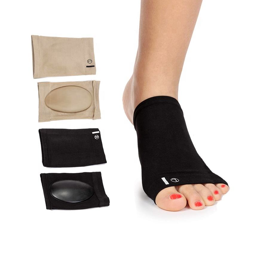 Black Foot Arch Support Sleeve worn on foot beside beige and black sleeve variants with gel pads shown