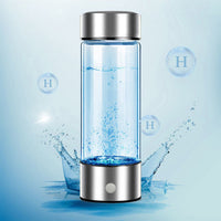 Silver hydrogen water bottle generator with H molecule bubbles on light blue background