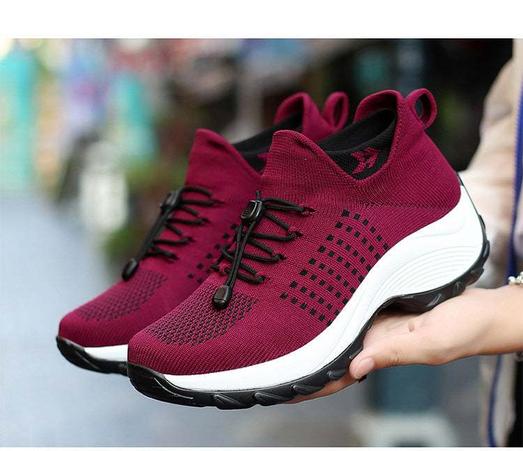 Burgundy Orthopaedic Comfort Shoes for Women held showing knit upper and sole