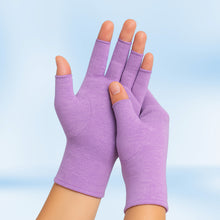 Load image into Gallery viewer, Pair of lavender Therapeutic Heat Gloves raised against light blue background
