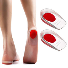 Load image into Gallery viewer, Rear view of bare feet wearing clear silicone gel heel cups with red pads, with two heel cups shown separately
