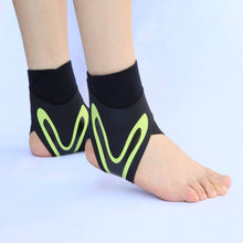 Load image into Gallery viewer, Pair of black and green Plantar X Wrap ankle wraps worn on both feet
