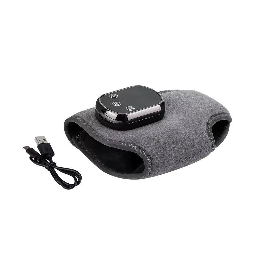 Ankle heating wrap laid flat beside a USB charging cable on white background