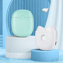 Load image into Gallery viewer, Mint green and white electric nail clippers displayed on blue pedestals against a blue backdrop
