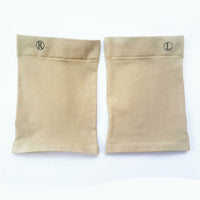 Pair of beige Foot Arch Support Sleeves flat lay showing R and L labels