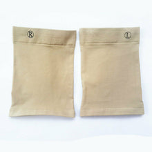 Load image into Gallery viewer, Pair of beige Foot Arch Support Sleeves flat lay showing R and L labels
