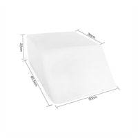 White wedge pillow shown with dimensions: 60.5cm length, 50cm width, 22cm height, 30cm top